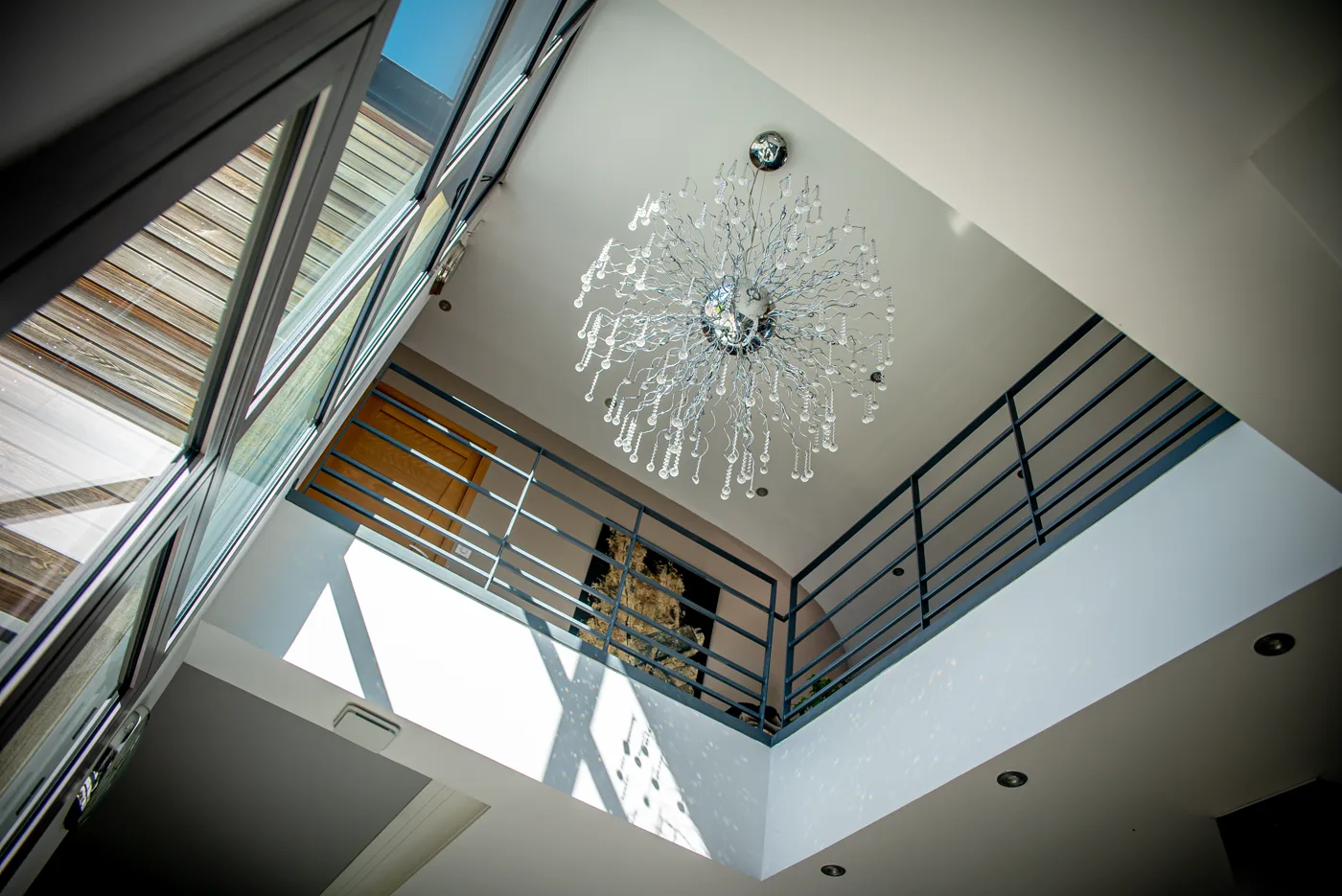 Maison individuelle — double hauteur et lumière zénithale, architecte Hauts-de-France